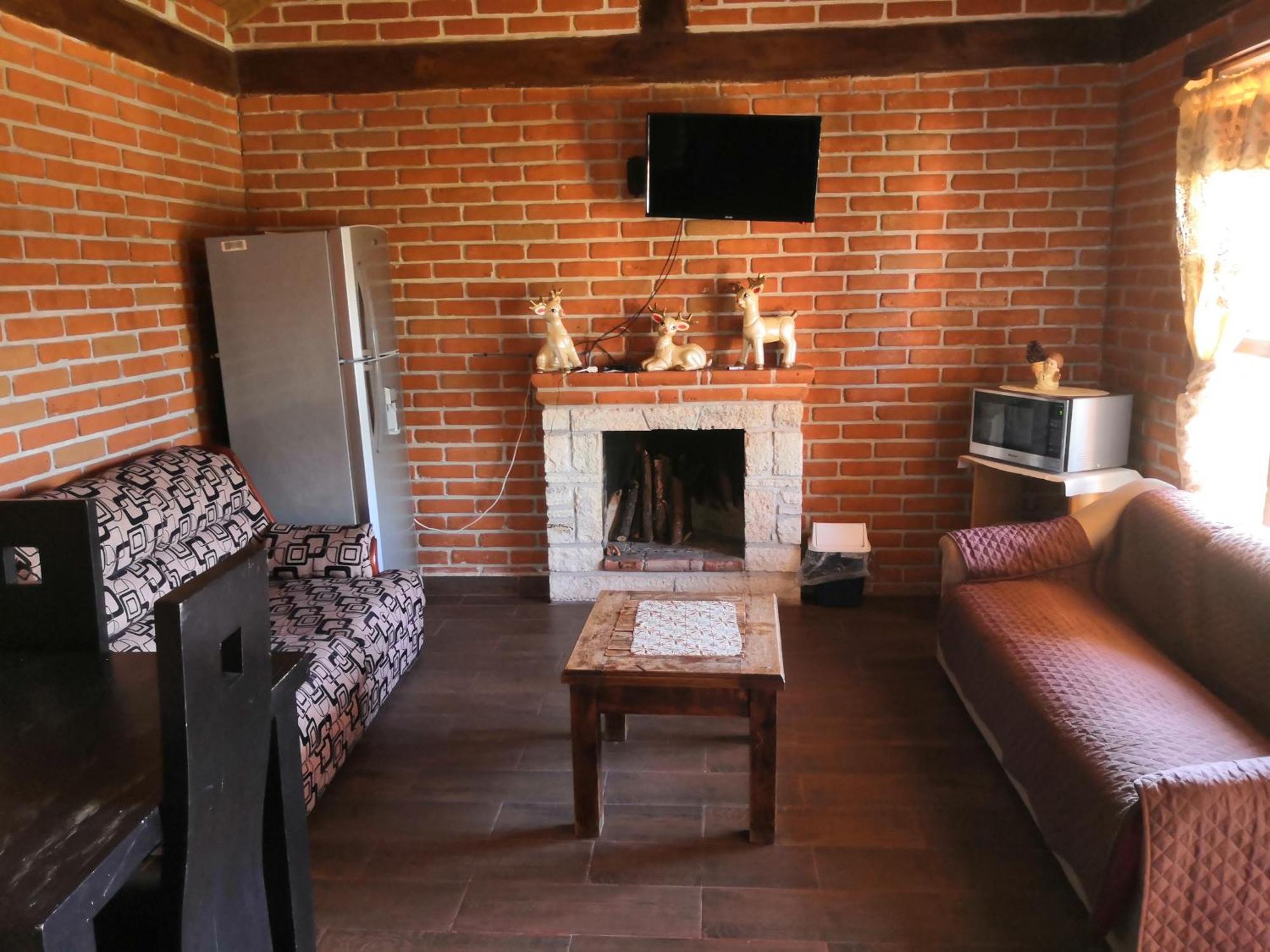Cabanas Villa De San Miguel 瓦斯卡坎波 客房 照片